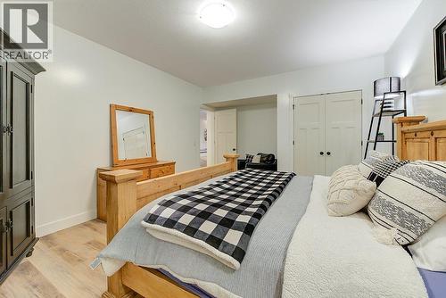 Lower level 5th Bedroom - 425 Audubon Court, Kelowna, BC - Indoor Photo Showing Bedroom