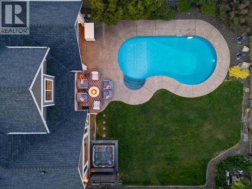 Outdoor salt water pool. Very private & quiet backyard. - 425 Audubon Court, Kelowna, BC - Outdoor With In Ground Pool