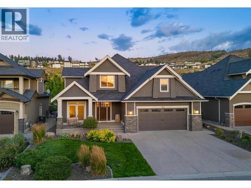 Lovely curb appeal with a beautiful entrance and quaint front porch - 425 Audubon Court, Kelowna, BC - Outdoor With Facade