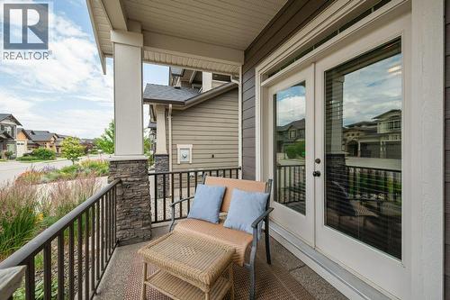 Streetside porch, just off the Den - 425 Audubon Court, Kelowna, BC - Outdoor With Deck Patio Veranda With Exterior