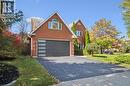 Traditional-style house with asphalt driveway and brick siding - 599 Beechwood Drive, Waterloo, ON  - Outdoor 