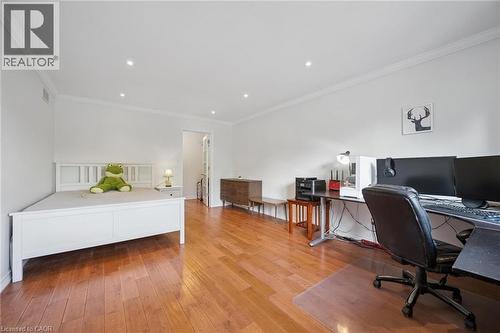 Office area with crown molding, light wood finished floors, and recessed lighting - 599 Beechwood Drive, Waterloo, ON - Indoor Photo Showing Office