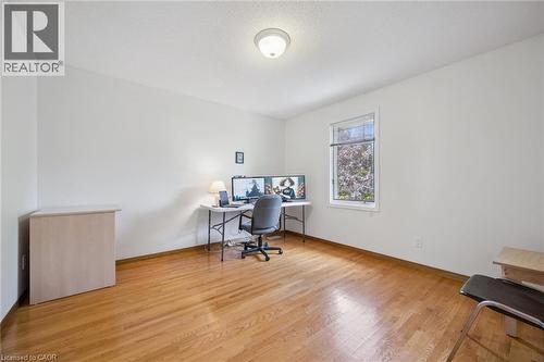 Home office with light wood finished floors and a textured ceiling - 599 Beechwood Drive, Waterloo, ON - Indoor Photo Showing Office