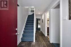 Spacious entry way and main floor hallway - 