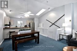 Open concept kitchen/dining area w sky light - 