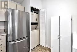 Upper Laundry closet w/ stackable washer/dryer - 