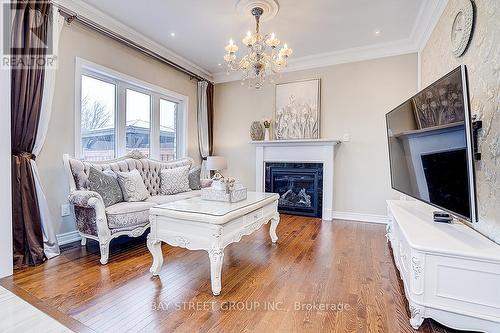 699 Baker Hill Boulevard, Whitchurch-Stouffville, ON - Indoor Photo Showing Living Room With Fireplace