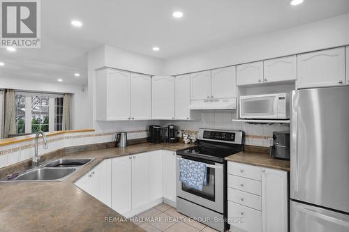 142 Inverkip Avenue, Ottawa, ON - Indoor Photo Showing Kitchen With Double Sink