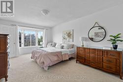 PRIMARY BEDROOM WITH BAY WINDOW - 