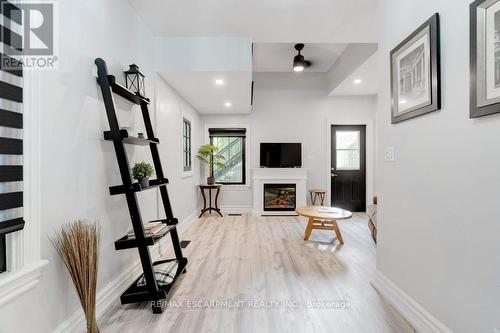 7 Homewood Avenue, Hamilton, ON - Indoor With Fireplace