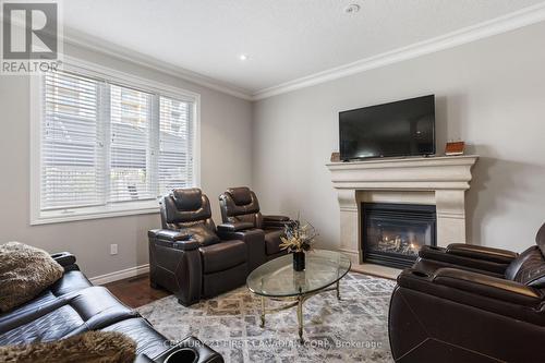 6621 Navin Crescent, London South (South V), ON - Indoor Photo Showing Living Room With Fireplace