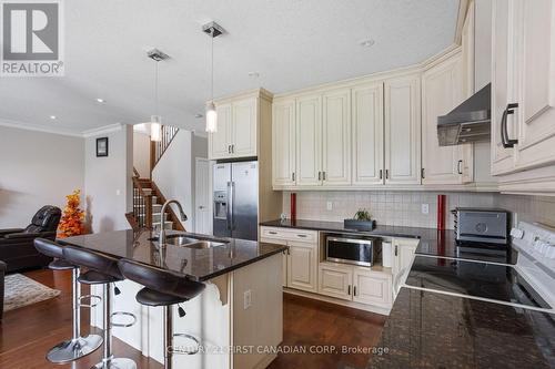 6621 Navin Crescent, London South (South V), ON - Indoor Photo Showing Kitchen With Double Sink With Upgraded Kitchen