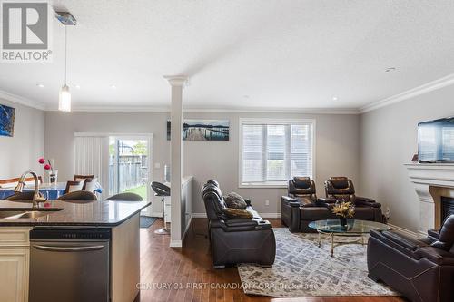 6621 Navin Crescent, London South (South V), ON - Indoor With Fireplace