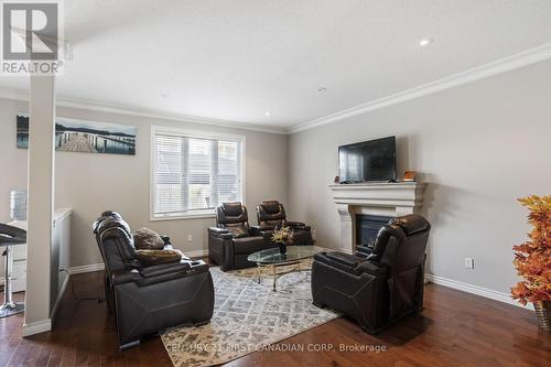 6621 Navin Crescent, London South (South V), ON - Indoor Photo Showing Living Room With Fireplace