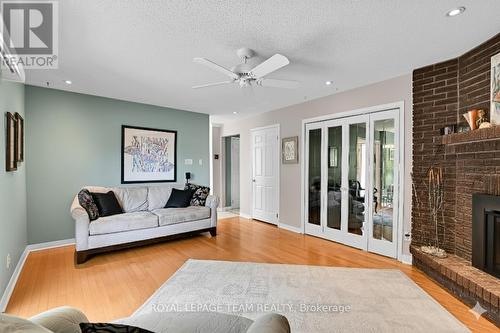64 Lillico Drive, Ottawa, ON - Indoor Photo Showing Living Room With Fireplace