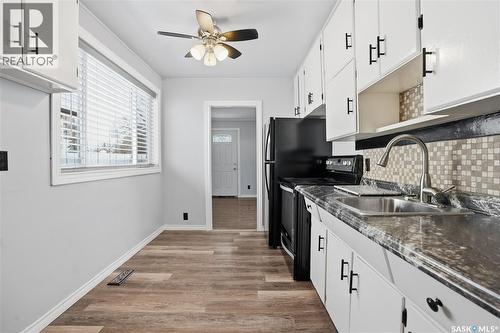 23 Ingersoll Crescent, Regina, SK - Indoor Photo Showing Kitchen With Double Sink