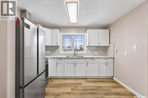 313 3Rd Avenue E, Shellbrook, SK - Indoor Photo Showing Kitchen With Double Sink
