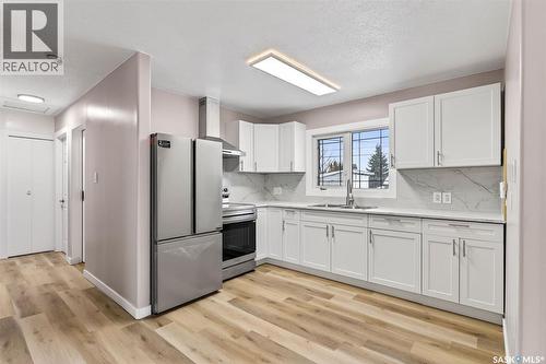 313 3Rd Avenue E, Shellbrook, SK - Indoor Photo Showing Kitchen With Double Sink
