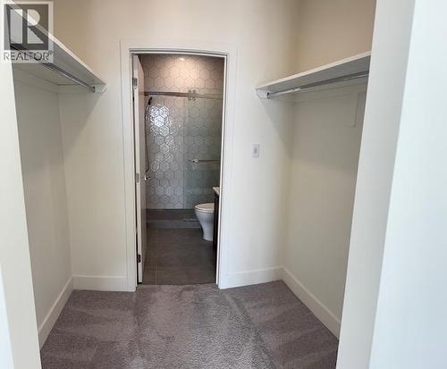 Master Walk in Closet - 885 University Drive Unit# 311, Kamloops, BC - Indoor With Storage