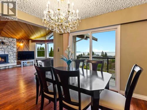 3826 Trail Place, Powell River, BC - Indoor Photo Showing Dining Room With Fireplace