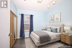Virtually staged as potential main floor bedroom. - 
