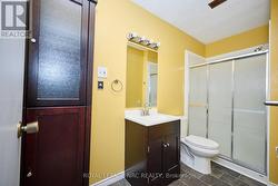 A 3-piece bathroom services the upstairs apartment - 
