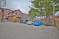 Generous parking at the back of the building. - 