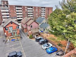 Overview of building with parking lot. - 