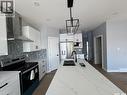 419 Stromberg Crescent, Saskatoon, SK  - Indoor Photo Showing Kitchen With Double Sink With Upgraded Kitchen 