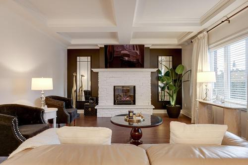 Living room - 7 Rue Hector-Maisonneuve, Blainville, QC - Indoor Photo Showing Living Room With Fireplace
