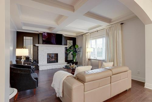 Living room - 7 Rue Hector-Maisonneuve, Blainville, QC - Indoor Photo Showing Living Room With Fireplace