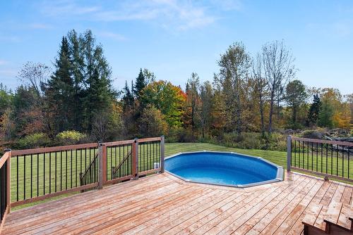 Backyard - 322Z  - 324Z Ch. De Wexford, Shannon, QC - Outdoor With Above Ground Pool With Backyard