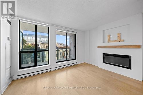 308 - 15 Murray Street, Ottawa, ON - Indoor Photo Showing Living Room With Fireplace