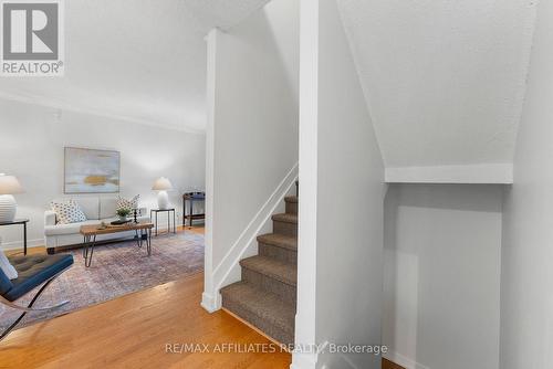 Living and Dining separated by staircase. - 31 Exeter Drive, Ottawa, ON - Indoor