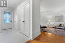 Sleek new doors & new ceramic tile! - 31 Exeter Drive, Ottawa, ON  - Indoor Photo Showing Other Room 