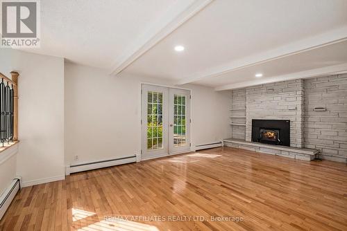 14 Riviere Nation Road, Casselman, ON - Indoor Photo Showing Living Room With Fireplace