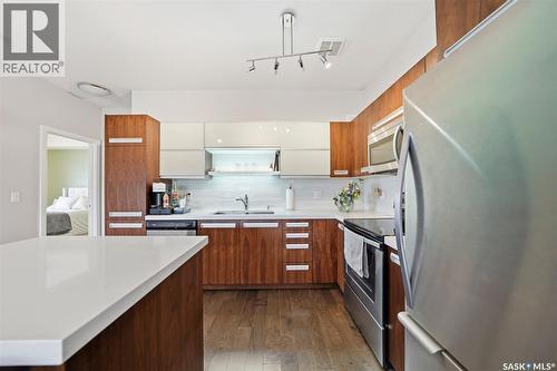 103 1120 Hampton Circle, Saskatoon, SK - Indoor Photo Showing Kitchen With Double Sink With Upgraded Kitchen