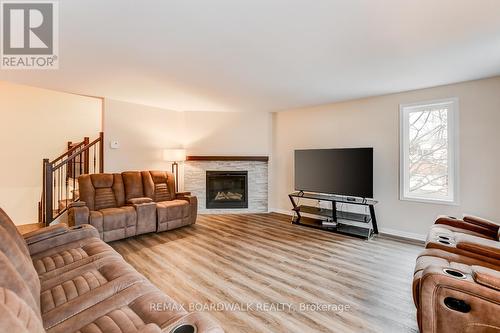 39 Inwood Drive, Ottawa, ON - Indoor Photo Showing Living Room With Fireplace