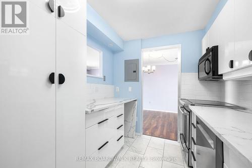 Updated kitchen with quartz countertops - 2305 - 1025 Richmond Road, Ottawa, ON - Indoor