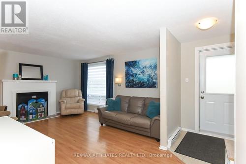 87A - 758 St Andre Drive, Ottawa, ON - Indoor Photo Showing Living Room With Fireplace