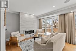 Living Room w/ gas fireplace. - 