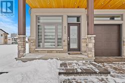 Inviting front porch with stone accents. - 