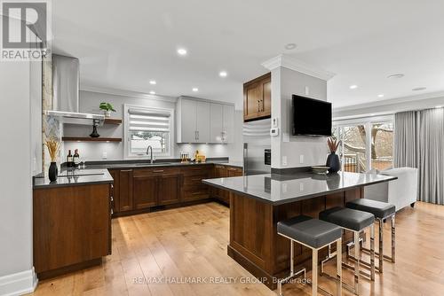 Chef's kitchen w/ stainless steel appliances. - 217 Belford Crescent, Ottawa, ON - Indoor Photo Showing Kitchen With Upgraded Kitchen