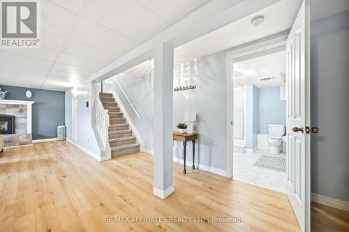 121 Stamford Drive, Drummond/North Elmsley, ON - Indoor Photo Showing Other Room With Fireplace