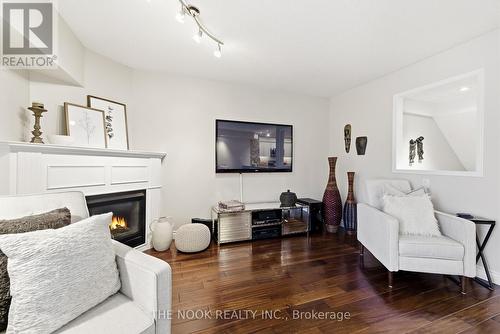 102 - 1995 Royal Road, Pickering (Village East), ON - Indoor Photo Showing Living Room With Fireplace