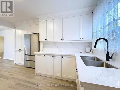4 Kitson Drive, Toronto, ON - Indoor Photo Showing Kitchen With Double Sink