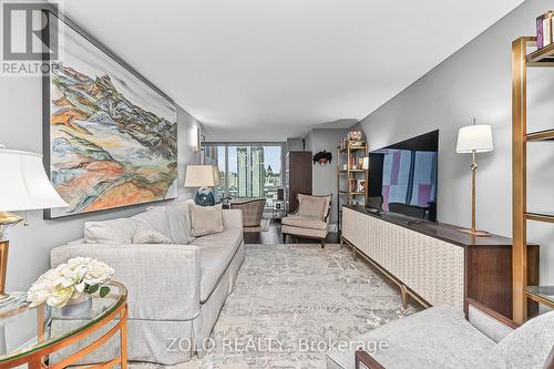 Wall to ceiling windows bring light to living room - 1101 - 160 George Street, Ottawa, ON - Indoor