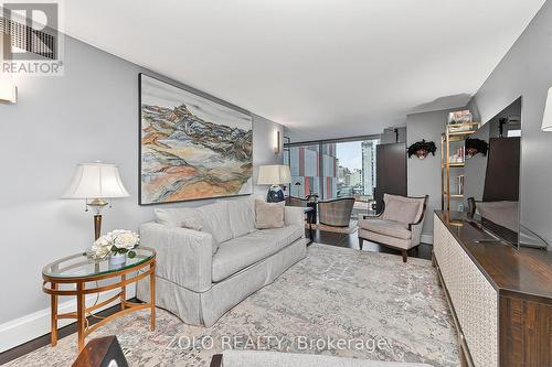Living room and sitting room beyond. - 1101 - 160 George Street, Ottawa, ON - Indoor Photo Showing Living Room