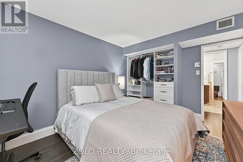 Built in shelving wardrobe in secondary bedroom. - 1101 - 160 George Street, Ottawa, ON - Indoor Photo Showing Bedroom