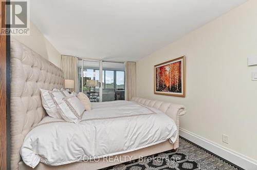 Primary bedroom with access to enclosed balcony. - 1101 - 160 George Street, Ottawa, ON - Indoor Photo Showing Bedroom